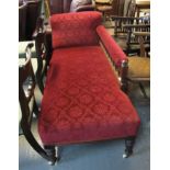 Edwardian mahogany upholstered chaise longue on ring turned legs and ceramic casters. (B.P.