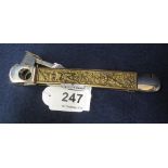 Vintage Solingen cigar cutter with gilded repousse cherub and foliate decoration. (B.P. 24% incl.