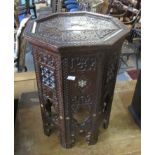 Middle Eastern design hardwood pierced and mother of pearl inlaid octagonal lamp table. (B.P.