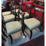 Set of six Trafalgar back style mahogany dining chairs with stuff over seats on saber legs. (6) (B.