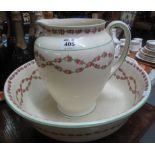 Early 20th Century crescent pottery rose design jug and basin set. (B.P. 24% incl.