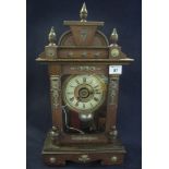 Early 20th Century German two train alarm architectural mantel clock with Roman face and gilt metal