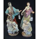 Pair of Meissen style figurines of a man and woman in classical robes,