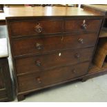19th Century oak straight front chest of two short and three long drawers, standing on bracket feet.
