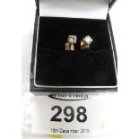 Pair of small diamond solitaire earrings. (B.P. 24% incl.