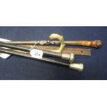 Collection of three gentleman's canes, one with silver collar and lacquered shaft,