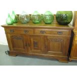 Art Nouveau design oak sideboard with organic carved decoration. (B.P. 24% incl.