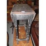 Small stained oak gate leg table. (B.P. 24% incl.