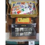 Mixed selection of stamps including on and off paper selection in two chocolate boxes,