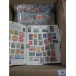 Box with All World stamp collection in album,