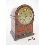 A mahogany cased mantel clock by Goldsmiths & Silversmiths Co Ltd, 112 Regent Street, London W. with