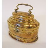 An Eastern brass food warmer circa late 19th / early 20th century, possibly Persian, of oval form,