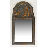 A 19th Century Chinoiserie black lacquer wall mirror, the mirror plate within a cushion moulded