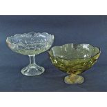 Two vintage pressed glass footed fruit bowls, one in clear glass and one in lime green on metal