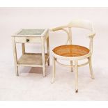 A vintage white painted bentwood armchair W61cm and a white painted two tier commode 46X46cm,