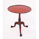 A Chippendale style mahogany tilt top table with a pie crust tray top, a single board with beautiful