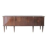 A Neoclassical-style dresser in mahogany veneer, inlaid with central marquetry motif, brass mounted,