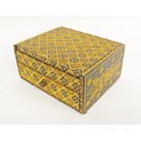 A wood and stamp decorated dressing table jewel box 24X19cm, H11cm