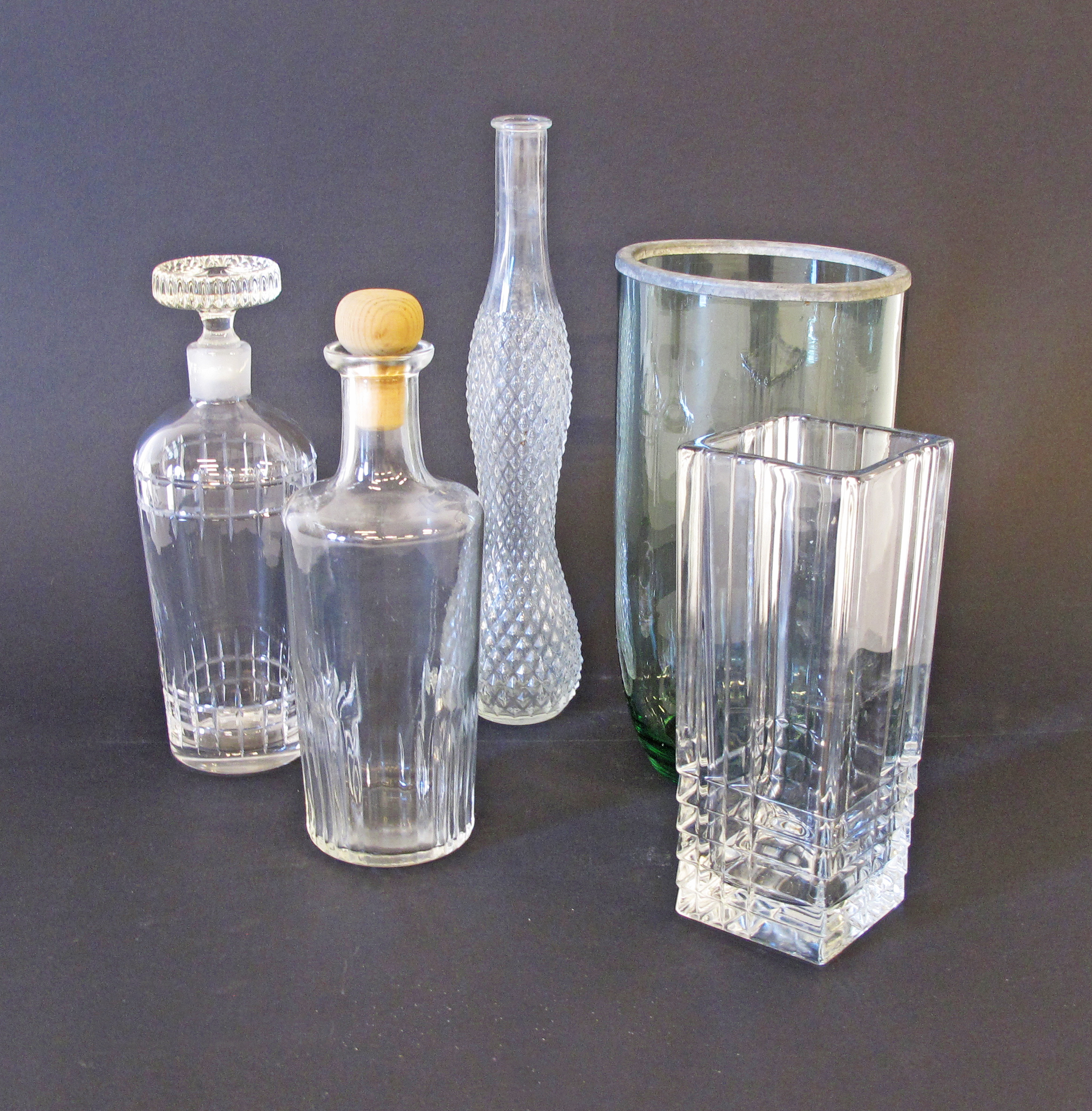 A collection of glass and crystal vases and decanters. (5)