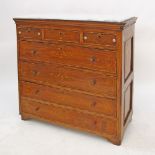 A Syrian hardwood commode, 4 long drawers under 3 smaller, with inlays of ebony, walnut and mother