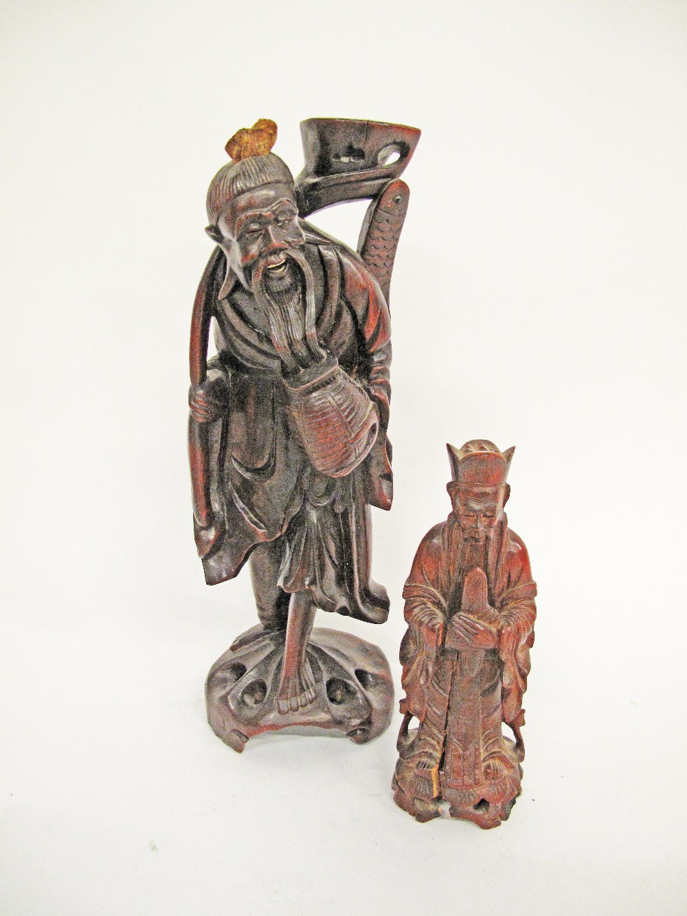 Two Chinese carved hardwood figures H35cm and H20cm (2)