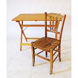 A folding beech work table 100X60cm, H76cm together with a provincial beech and wicker chair