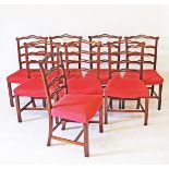 A set of 8 Chippendale style mahogany dining chairs, ladder back shaped head rails and pierced