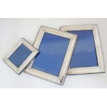 Three Silver plated photo frames, the two 225X175mm and one 130X10mm (3)