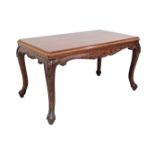 A carved walnut vintage coffee table 1950-60s on cabriole legs H46cm, 83X45cm.