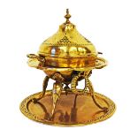 A Persian pierced brass brazier, reticulated dome, removable twin handled pan, on a twin handled