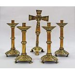 A set of four brass candlesticks H33cm and H30cm together with a matched cross H46cm, c19th