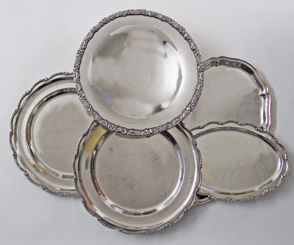 A collection of five silver plated dinner serving dishes, with gadrooned rim, comprising two oval