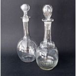Two clear glass decanters with stoppers, approx. H32cm. (4)