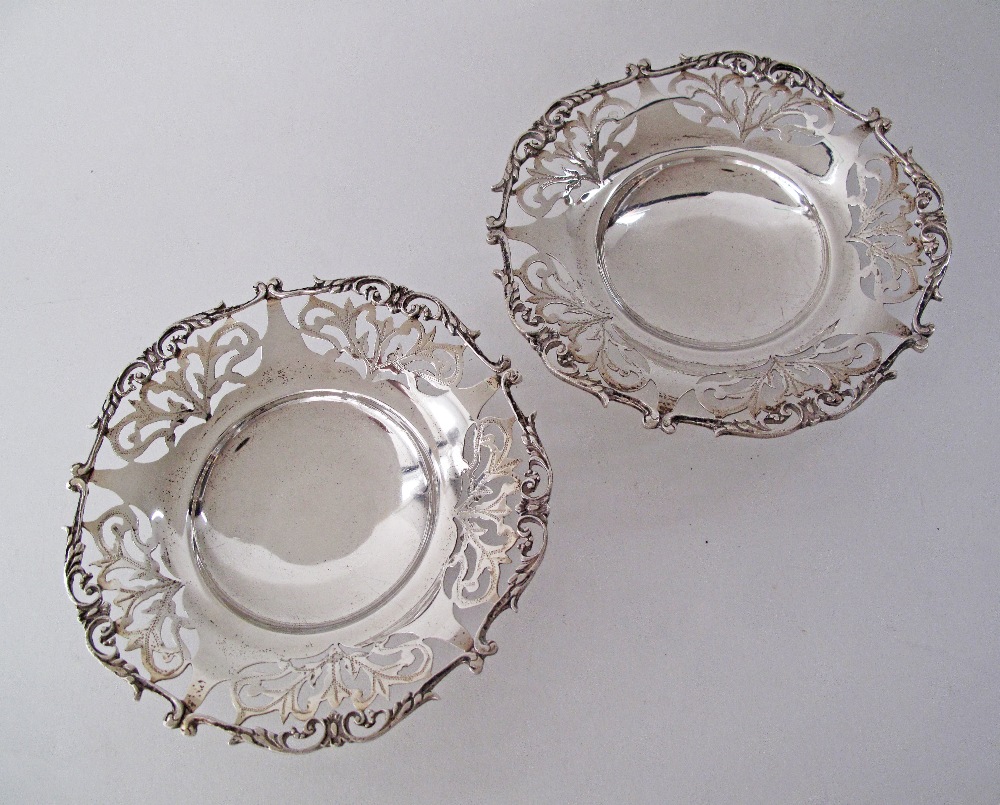 An Egyptian pair of silver bowls with reticulated rims, W16cm, weight 312g