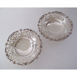 An Egyptian pair of silver bowls with reticulated rims, W16cm, weight 312g