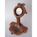 French gold pocket watch on stand