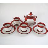 A set of French porcelain coffee cups and saucers together with a large sugar bowl with cover,
