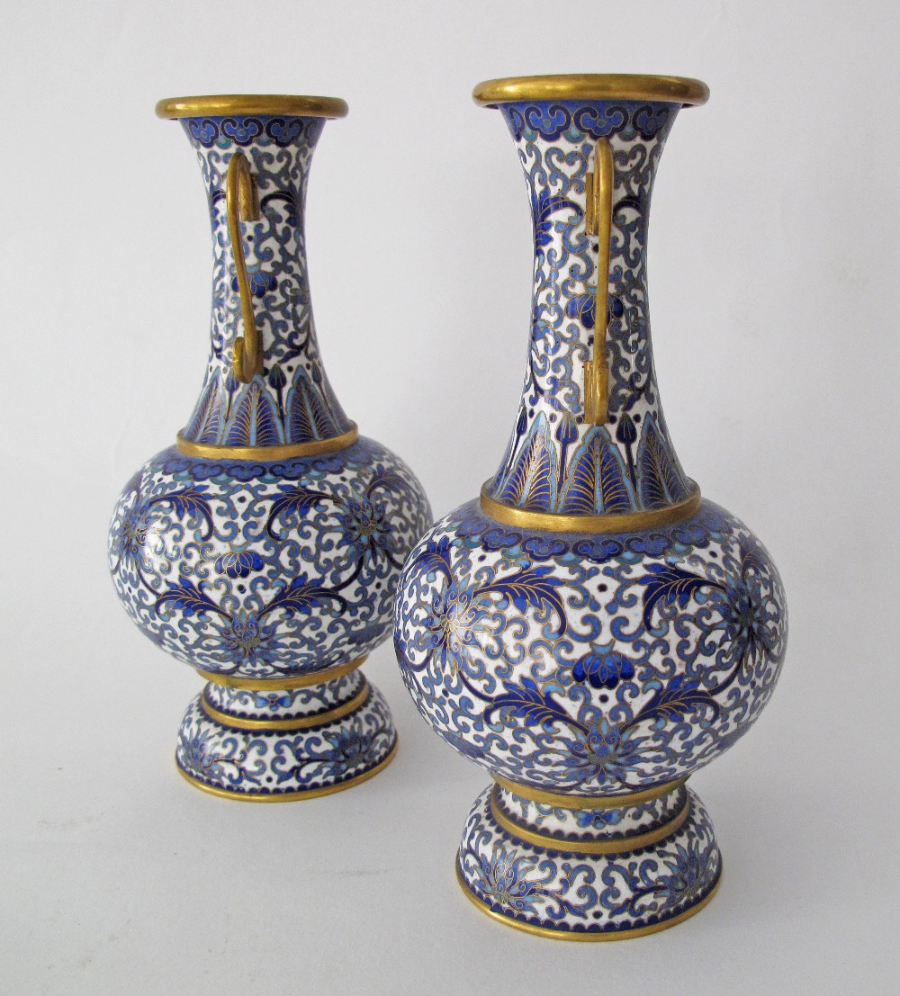 A pair of Chinese cloisonné bottle vases with flared rim and handles, decorated in blue and white, - Image 4 of 8