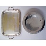 A silver plated twin handled serving tray of rounded rectangular form, the edges and handles of reed