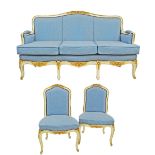 A Louis XV style, French reproduction three seater sofa together with a pair of salon chairs,