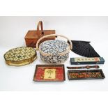 Three wood sewing boxes with some sewing materials, a printed wooden tray, a black Chinese fan