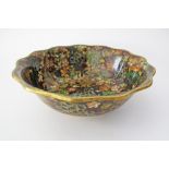 A large Chinese cloisonné bowl with serpentine rim decorated in the mille fiori pattern, mid 20th