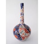A Japanese imari ceramic bottle vase. H21cm.