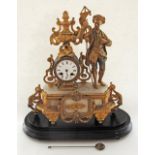 A French ormolu spelter and white marble mantle clock with a figure in 18th century attire on