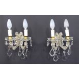 A pair of two light wall sconces with lead crystals H32cm, W20cm. (2)