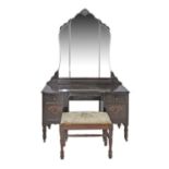 Carved walnut dressing table with mirror on turned legs with castors. W107cm, D46cm, H173cm together