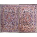 A Fine pair of Persian silk mixture carpets with a very high density of knots per square inch, in