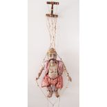 A wood puppet of an Asian man on strings H40cm.