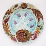 A French majolica plate specifically for asparagus! Please note the complex colors and three