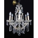 A seven light lead crystal chandelier W50cm, H70cm.